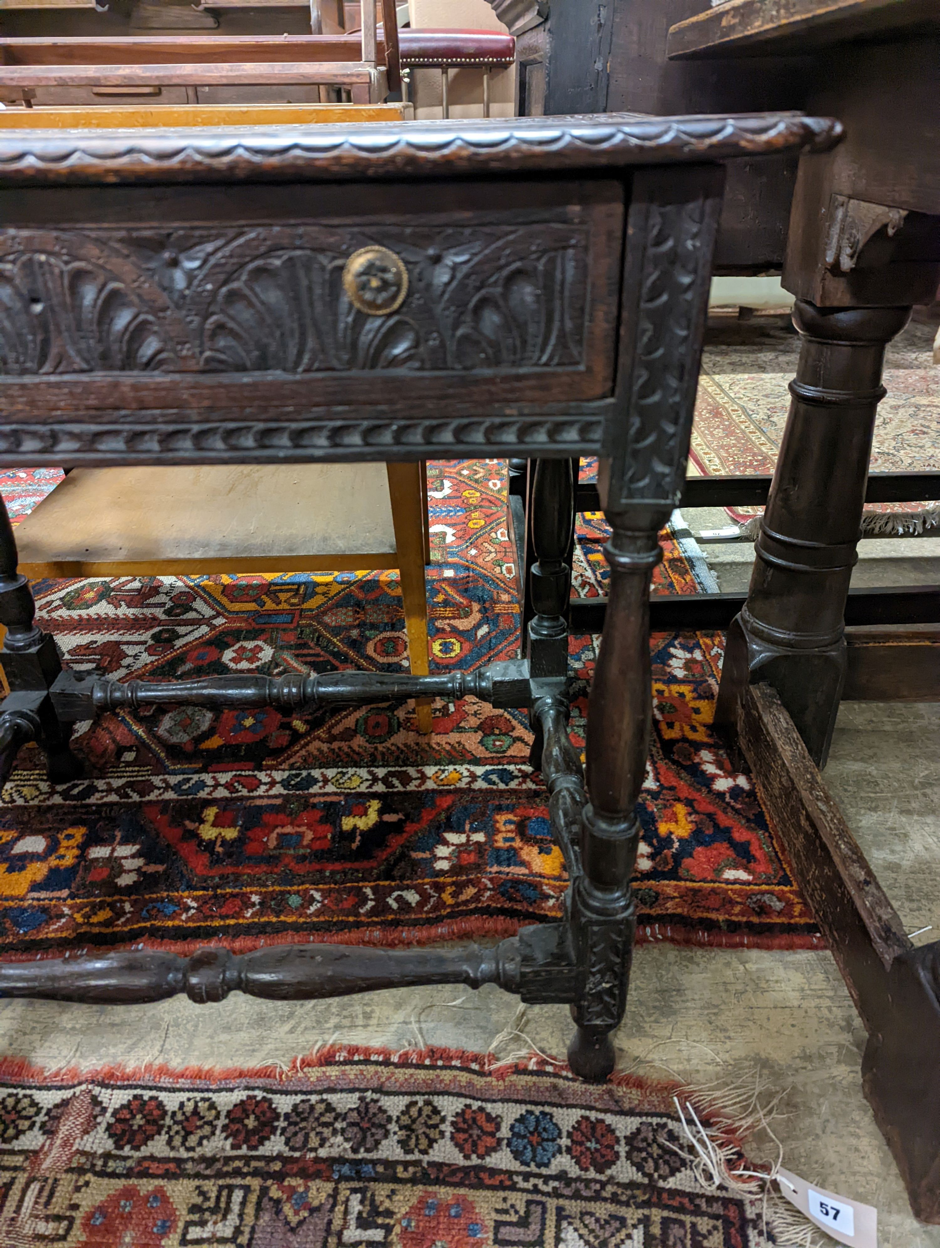 An 18th century carved oak side table, width 71cm, depth 47cm, height 67cm